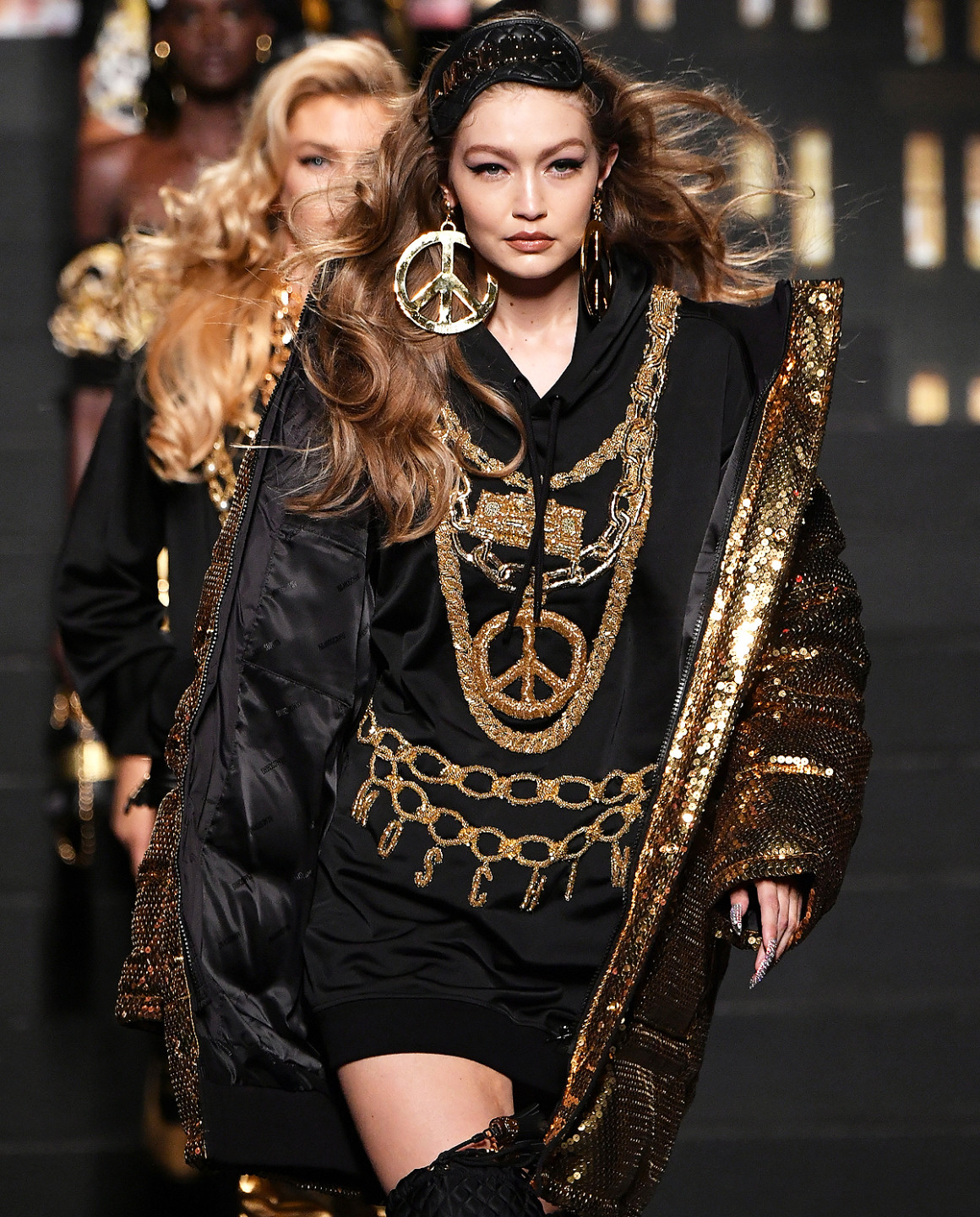 NEW YORK, NY - OCTOBER 24:  Gigi Hadid walks the runway during the Moschino x H&M - Runway at Pier 36 on October 24, 2018 in New York City.  (Photo by Mike Coppola/Getty Images)